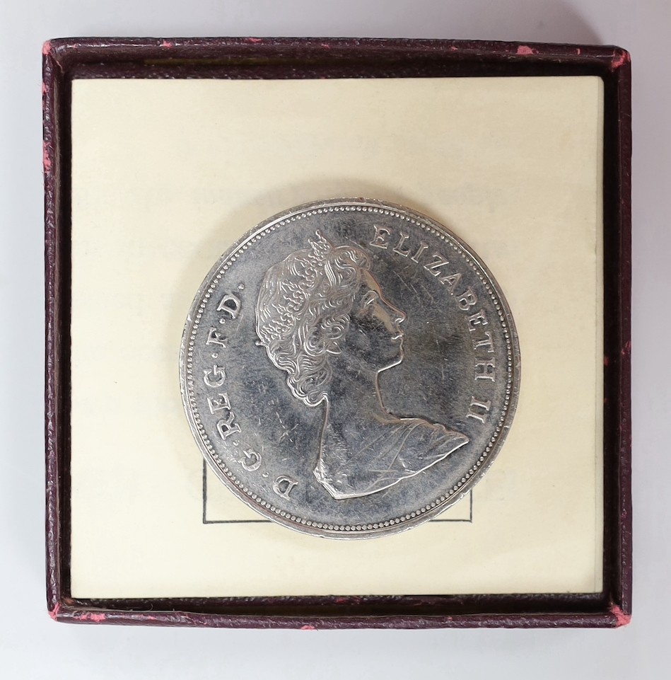 A selection of collectibles, including two silver photo frames, badge buttons, buckles, beading, coinage etc.